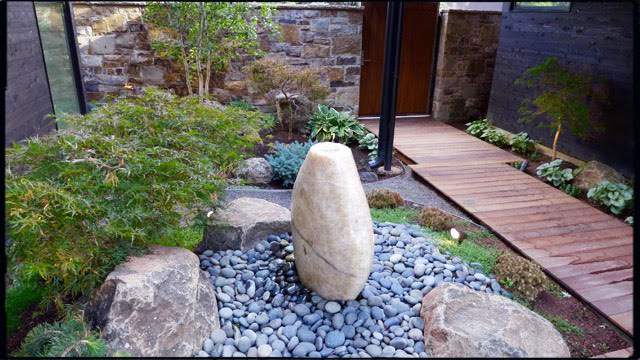 Mortared Telluride stone 6 inch veneer. Fountain and landscape by Casey Bynum