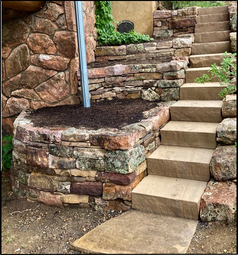 Moss rock planters and sandstone stairs